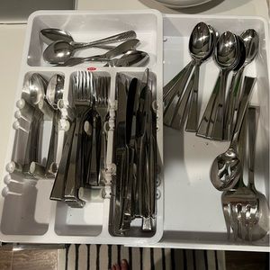 Twelve place settings of silverware